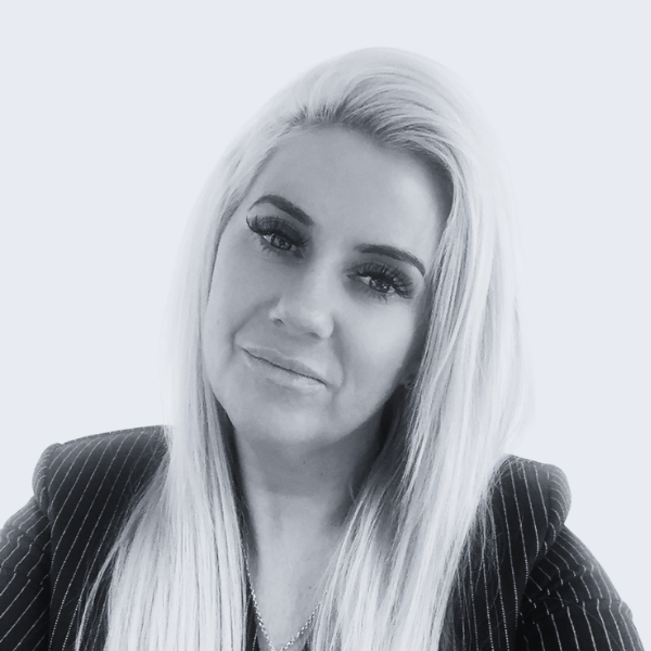 Photo shows a woman with long blonde hair, in a pin-striped jacket, looking at the camera. Representing a recruitment agency near you, in Ashby.