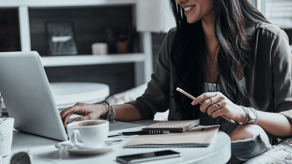 Women learning at laptop at home, remote learning