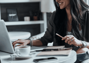 Women learning at laptop at home, remote learning